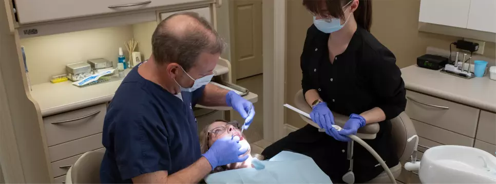 Dr. Charles White doing a root canal